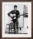 Bob Dylan Playing Guitar and Harmonica into Microphone 1965