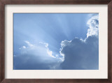 Sky with Rays of Sun and Clouds