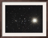 Saturn in the Beehive Star Cluster