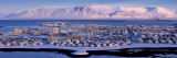 Buildings in a City With a Mountain in The Background  Mt Esja  Reykjavik  Iceland