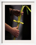 Person Holds a Palm Frond Bended into Shape of Cross During Palm Sunday Mass at Cathedral in Havana