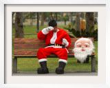 Ronald Guzman  Who Works as Santa Claus  Takes a Break in a Public Park in Lima  Peru