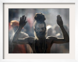 Naked Hindu Holy Man Performs Rituals on Banks of River Ganges During the Kumbh Mela in India