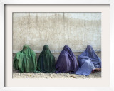 Women Wearing Burquas Wait to be Received at a Clinic
