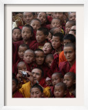 Buddhist Monks Watch a Show During a Public Meeting Addressed by the Dalai Lama