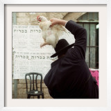 An Ultra Orthodox Man Swings a Live Chicken Over His Head