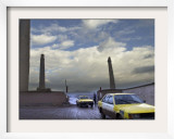 Taxis Pass a Guard in Herat  Afghanistan  in This December 7  2001 Photo
