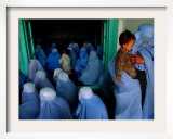 Afghan Women Wearing Burqas Listen to a Speech by Presidential Candidate Massooda Jalal