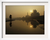 Stray Dog on a Sand Bank of the Yamuna River as the Sun is Seen Rising over the Taj Mahal in India
