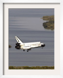 Space Shuttle Discovery Glides over the Banana River to a Landing on Kennedy Space Center's Runway