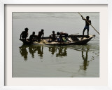 Fishermen Cast their Nets in the River Ganges on the Outskirts of Allahabad  India
