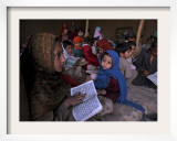 Afghan Refugee Children Holding Copies of the Quran  Repeat after their Teacher