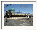 Iraqi Children Play Soccer on a Deserted Street