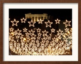 Christmas Lights Shine Over a Street