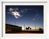 Exhaust and Smoke from the Space Shuttle Discovery Swirls over the Kennedy Space Center
