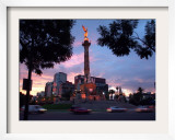 Traffic Passes by the Angel of Independence Monument in the Heart of Mexico City