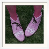 A Code Pink Member Demonstrates Her Feelings for President Bush During a Rally Opposing the War