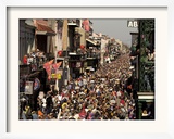 Revelers Pack the French Quarter's Famous Bourbon Street During the Annual Mardi Gras Celebration