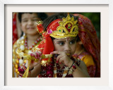 A Child Enacts the Life of Hindu God Krishna During Janamashtami Celebrations