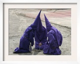 Cucuruchos Pray Before an Easter Procession