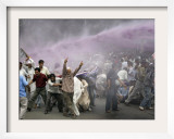 Kashmiri Transporters Shout Amidst Tear Gas Smoke and Colored Water at a Protest in Srinagar  India