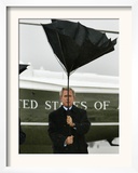 President Bush Jokingly Holds His Wind-Blown Umbrella Upright