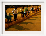 Young Guineans Study under the Dim Parking Lot Lights at G'Bessi Airport in Conakry  Guinea