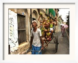 A Rickshaw Puller Carries Supporters of Brazil Soccer Team