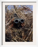 A Scout Observer Practices Observation Techniques Using a Homemade Ghillie Suit