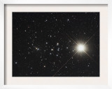 Saturn in the Beehive Star Cluster