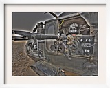 A UH-60 Black Hawk Door Gunner Manning a M240G Medium Machine Gun