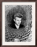 James Dean Peeking Through a Spiral of Chicken Wire  Mid-1950s