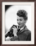 Evelyn Keyes  with a Rolex Camera  Mid-1940s
