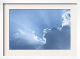 Sky with Rays of Sun and Clouds