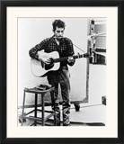 Bob Dylan Playing Guitar and Harmonica into Microphone 1965