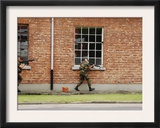 Belgian Soldiers on Patrol around a Suspect Building