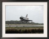 Space Shuttle Discovery Approaches Landing on the Runway at the Kennedy Space Center