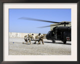 Soldiers Rush a Simulated Casualty to a UH-60 Blackhawk Helicopter