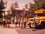 Elementary School Students Crossing Street in Front of School Bus