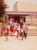 Children Running Down Steps From Elementary School