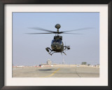 An Oh-58D Kiowa Warrior Hovers over the Flight Line at Camp Speicher  Iraq