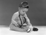 Baby Dressed in Diaper Stethoscope and Opthalmoscope