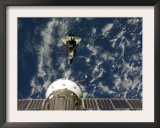 Space Shuttle Endeavour and a Soyuz Spacecraft