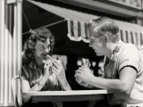 Couple Eating Hot Dogs