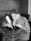 Boy Wearing a Donegal Tweed Suit Sitting at His School Desk