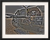 A UH-60 Black Hawk Door Gunner Manning a M240G Medium Machine Gun
