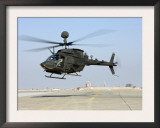 An Oh-58D Kiowa Warrior Hovers over the Flight Line at Camp Speicher  Iraq
