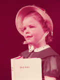 Girl Wearing Straw Hat  Holding Bible