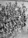 Group of Children in Swimming Pool  Waving  Portrait