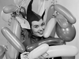 Woman in Elf Costume  Smiling  Surrounded By Balloons  Portrait